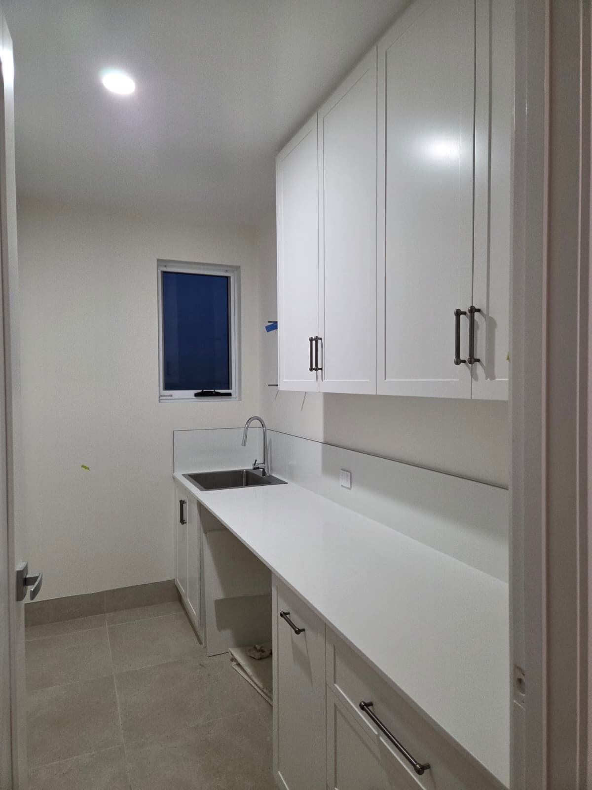 Laundry downlight and appliance outlets wired by MVS Connect
